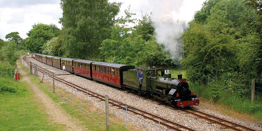 Riding on the Bure Valley Railway into a picturesque landscape